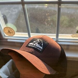 The North Face burgundy and Ebony Cap